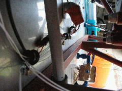 Firewall feedthrough for wires. This is a 90 degree tube that will be pumped full of firestop caulk and has a firesleeve clamped around it IMG_0702.jpg